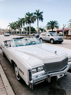 Parked White Coupe